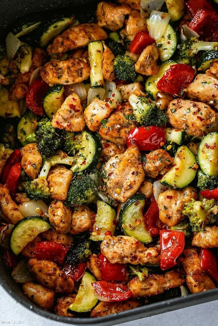 Colorful chicken air fryer veggie stir fry packed with fresh vegetables