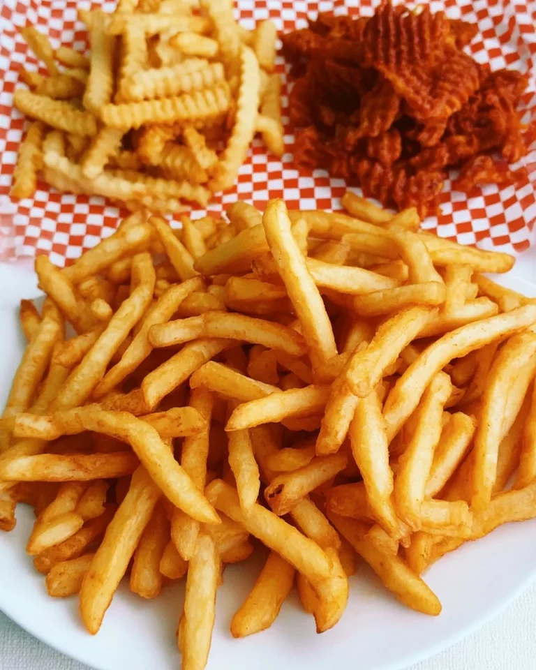 Crispy air fryer frozen French fries served in a bowl.