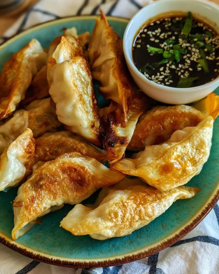Crispy air fryer potstickers served with dipping sauce
